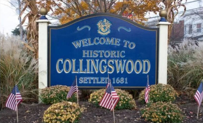 Welcome to Historic Collingswood sign with American flags